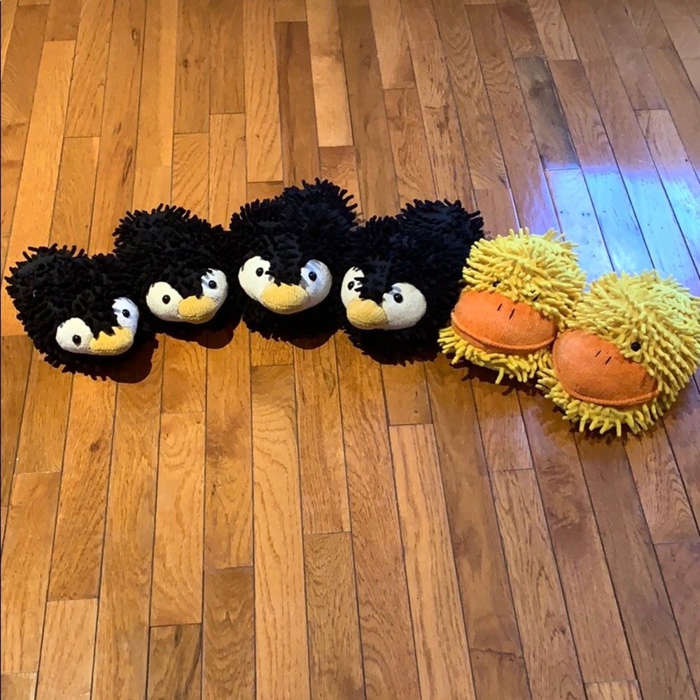 Funfeet slippers.Barely worn. $8 each. Penguins.